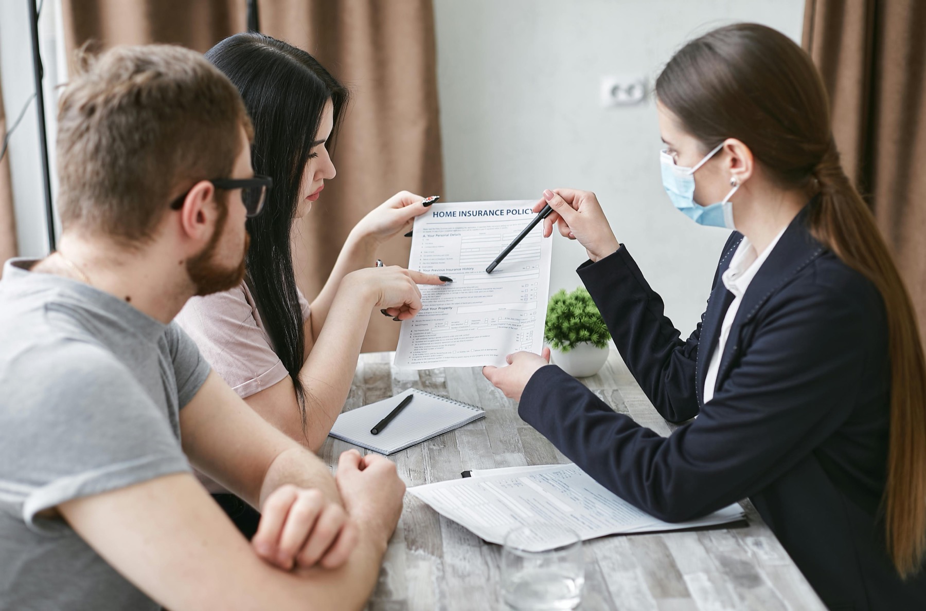 Advisor explaining financial paperwork